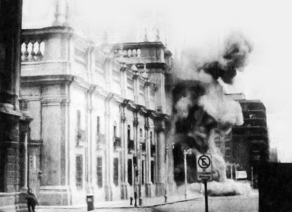 Smoke rises from La Moneda palace as troops attack
