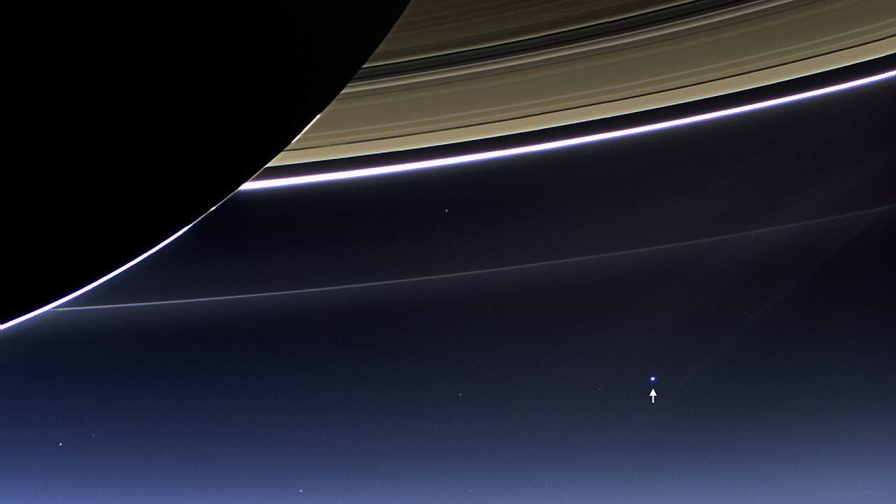 The Cassini spacecraft captures Earth as a pale blue dot from the Saturn system