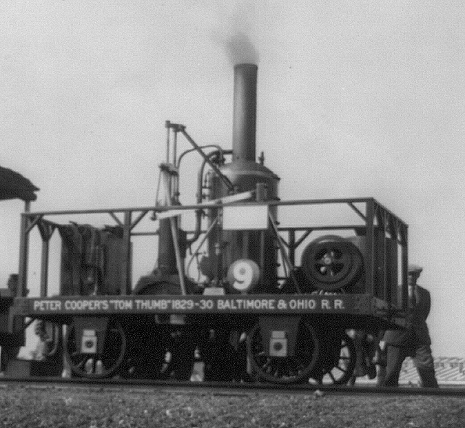Tom Thumb, the first American steam locomotive, challenges a horse-drawn car in Maryland