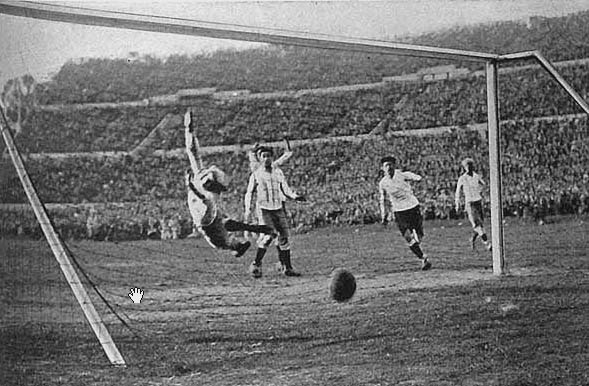 Action during the inaugural 1930 FIFA World Cup tournament held in Montevideo, Uruguay