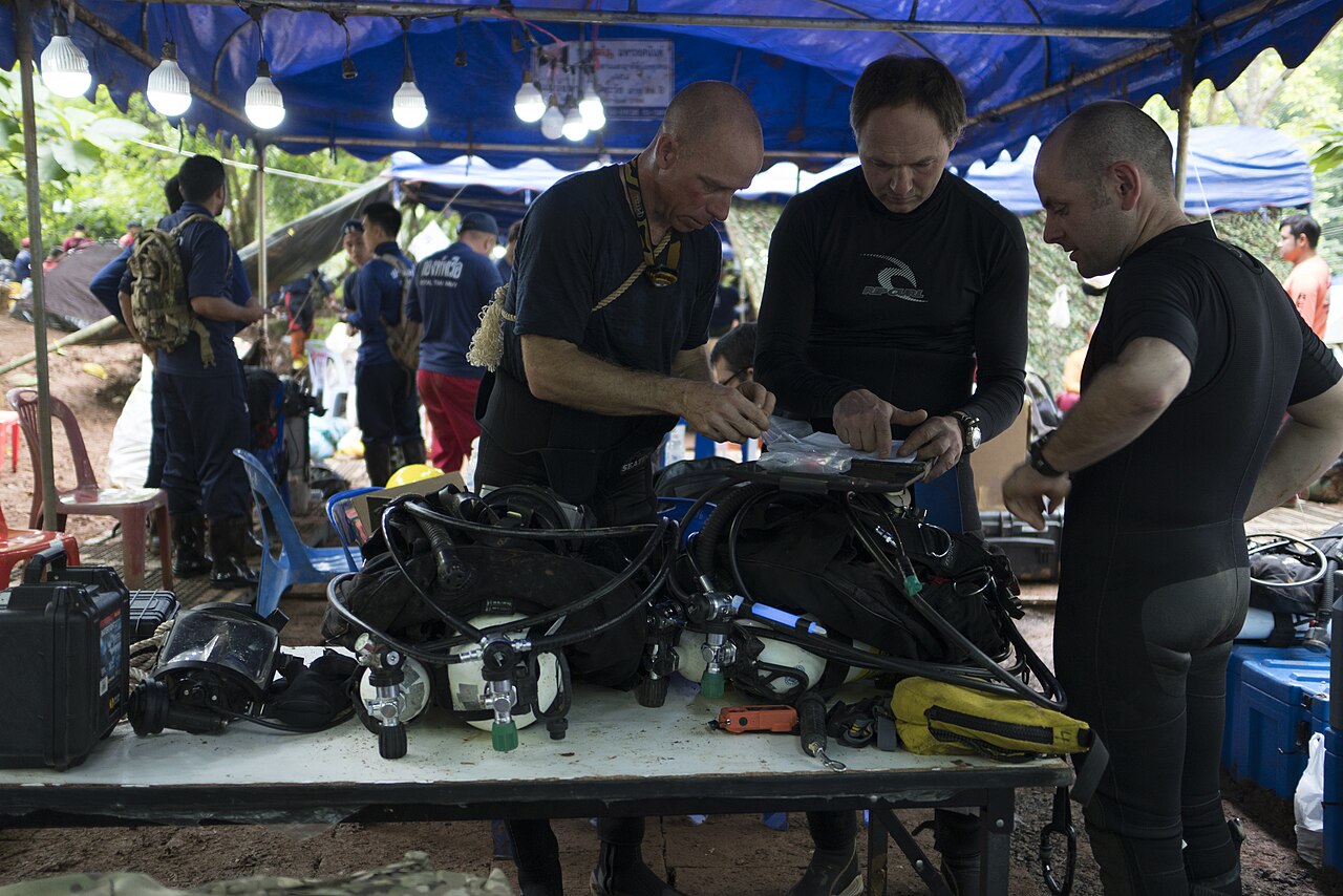 Divers prepare equipment for the Tham Luang cave rescue of the Wild Boars team