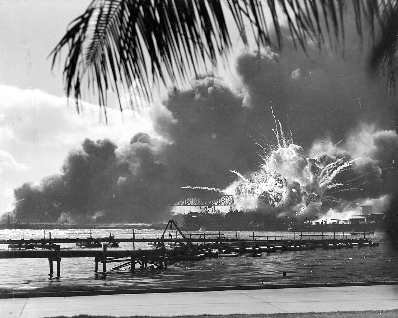 The Japanese surprise attack on Pearl Harbor devastates the U.S. Pacific Fleet in Hawaii