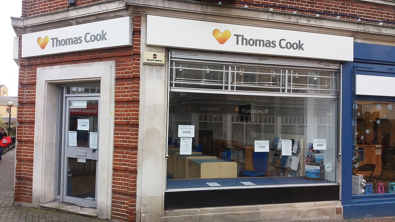 A Thomas Cook travel agency with closed signs posted on windows and door