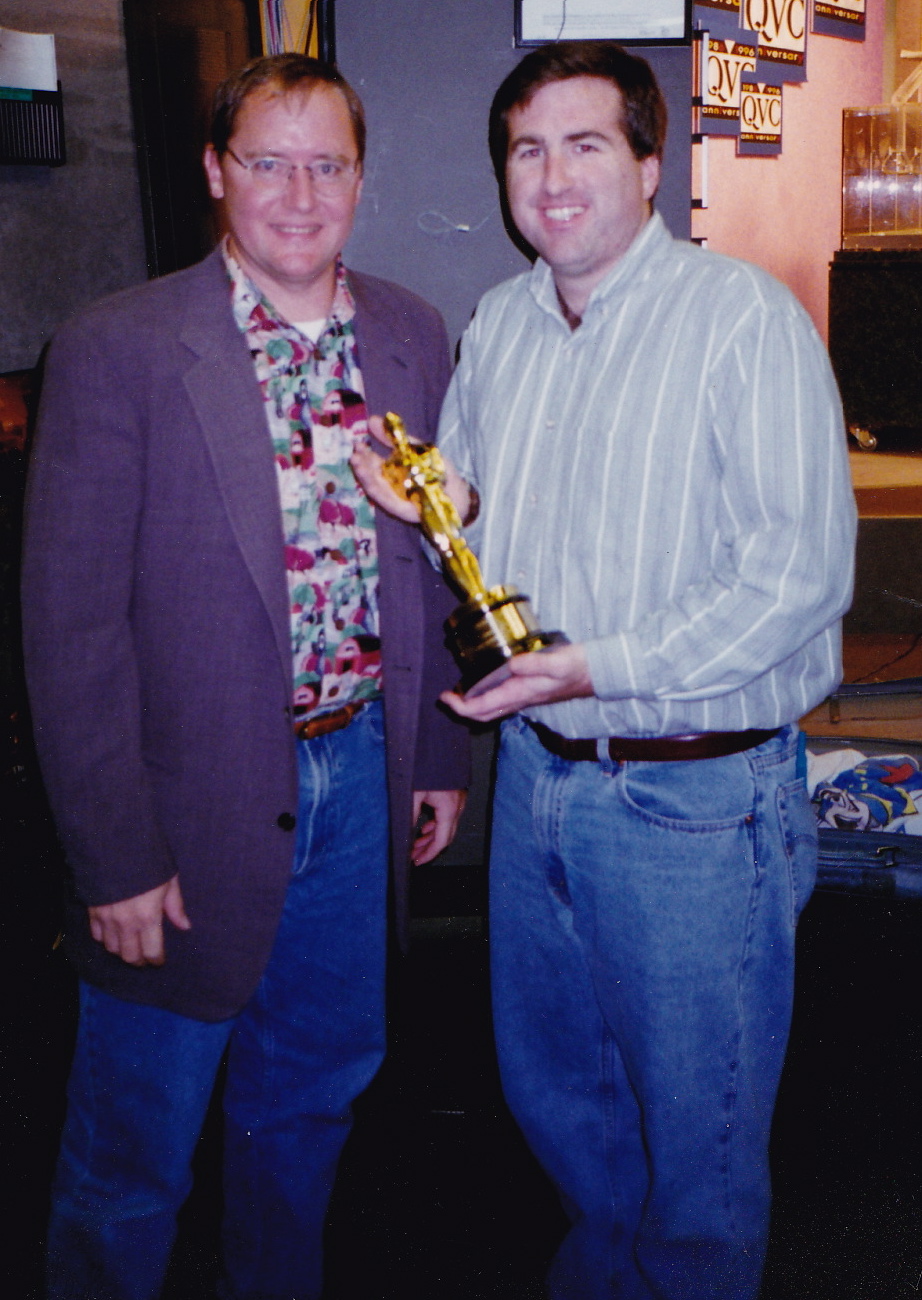 The film's director and producer hold their Academy Award