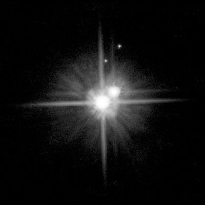 Pluto, reclassified as a dwarf planet