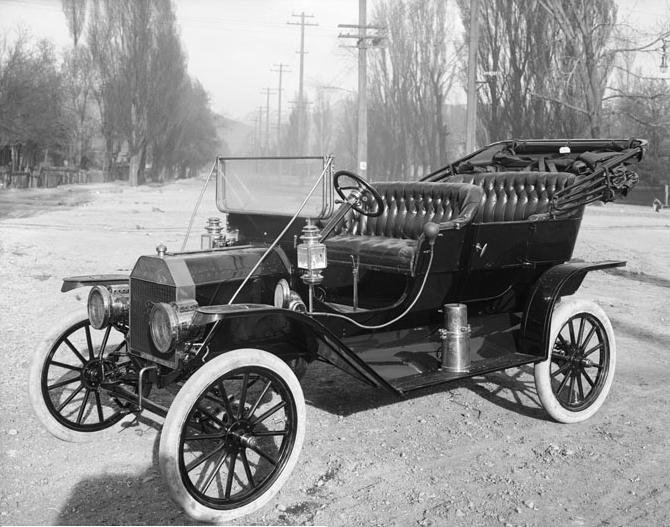 The first Ford Model T stands on a Detroit road