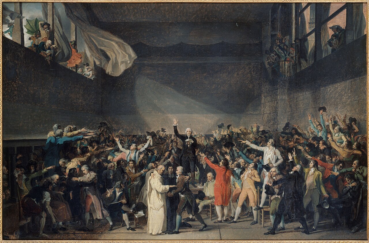 The National Convention meets in the Tuileries, deputies raising hands in debate