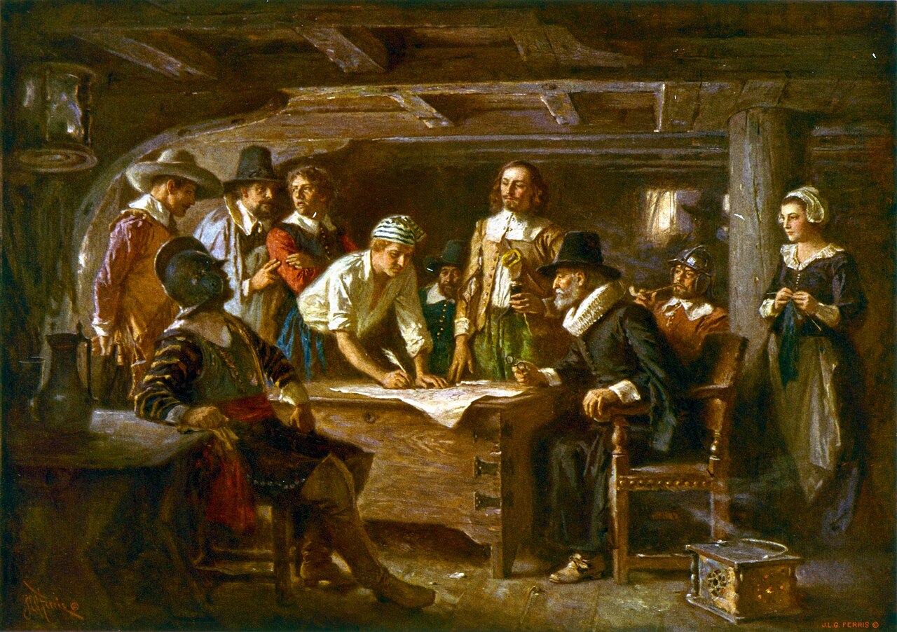 Passengers gather in the Mayflower's cabin to sign the compact