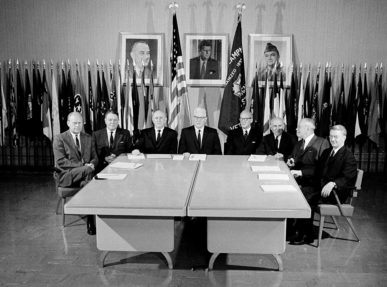 The Warren Commission members present their findings to President Johnson