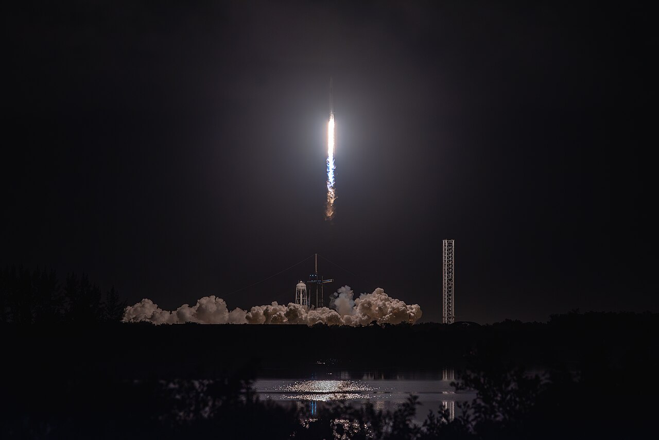 The Falcon 9 rocket lifts off from Kennedy Space Center at night