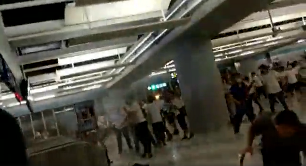 Suspected triad members attack anti-extradition protesters at the Yuen Long MTR station