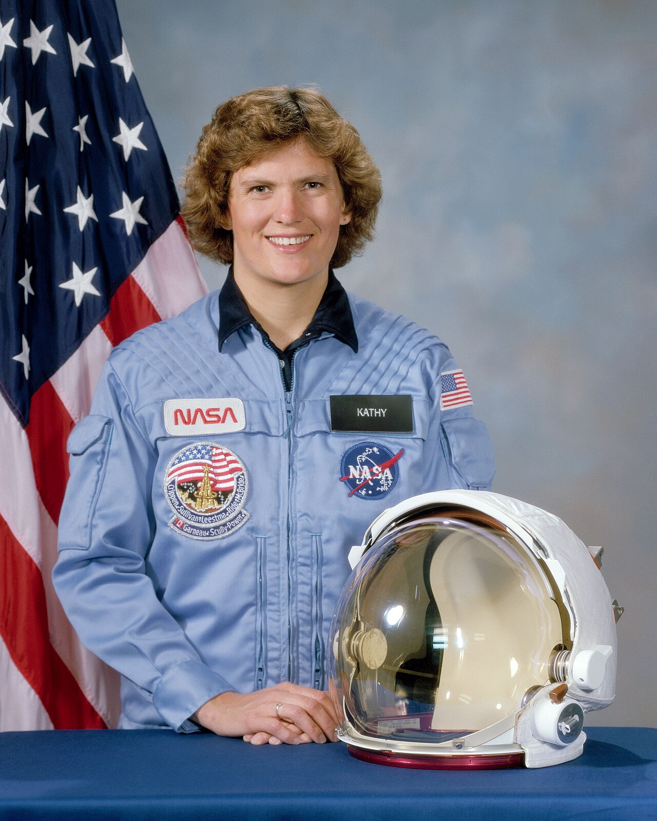 Kathryn Sullivan in her NASA flight suit with helmet
