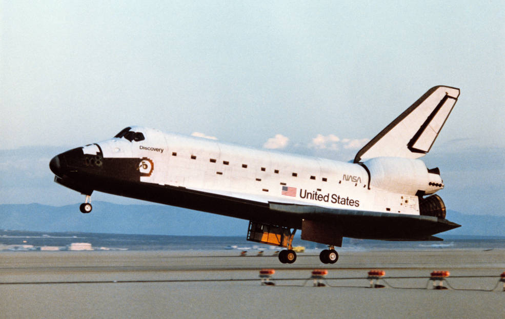 Space Shuttle Discovery touches down at Edwards Air Force Base