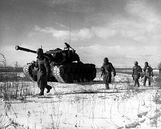 U.S. 24th Infantry Division troops engage North Korean forces during the Korean War