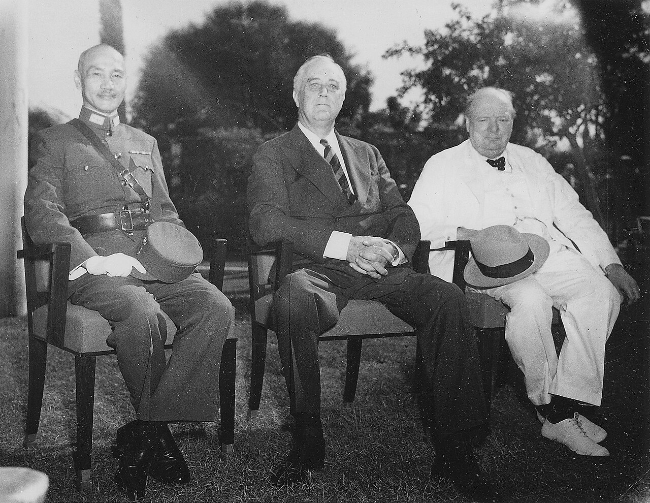 Chiang Kai-shek, Roosevelt and Churchill sit together in Cairo
