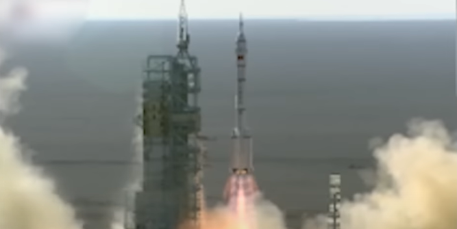 The Shenzhou 5 rocket lifts off from the launch pad