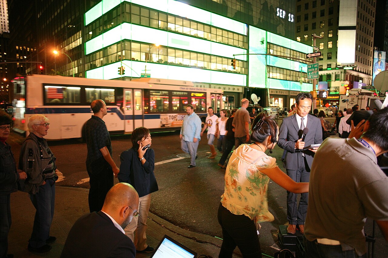 Television crews gather outside the Lehman Brothers headquarters after the bankruptcy filing