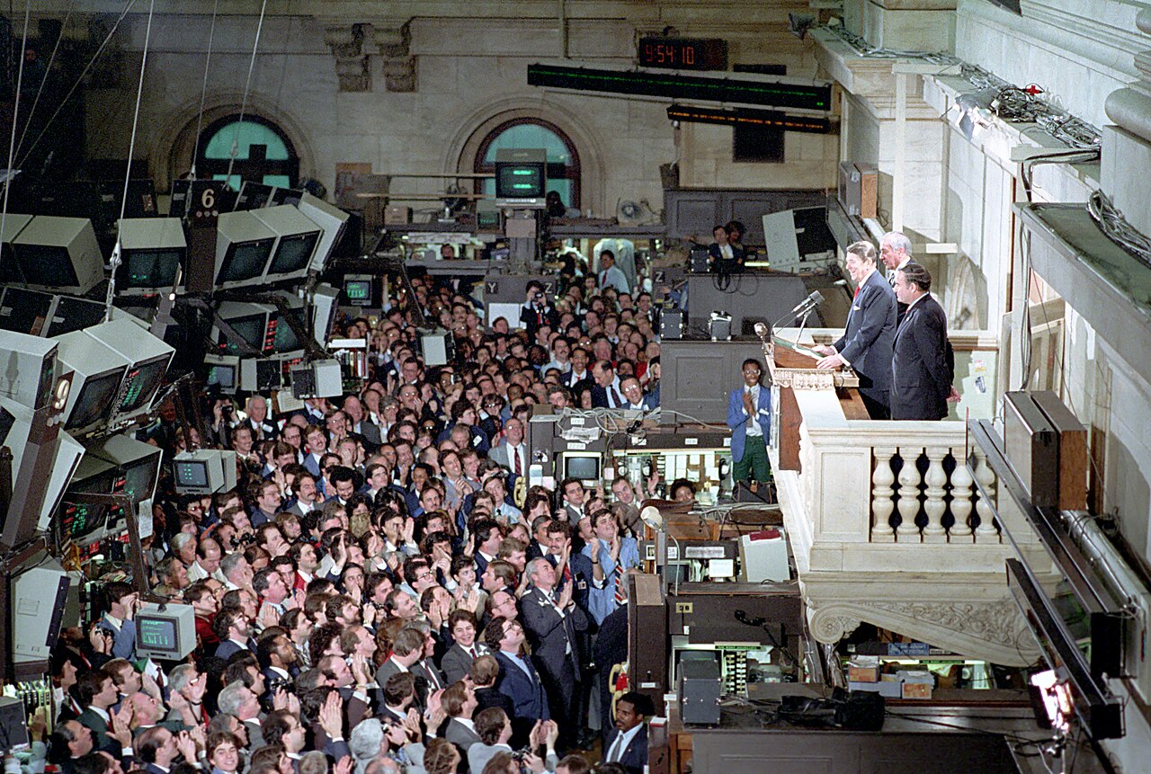 Traders and officials gather as the exchange reopens for business
