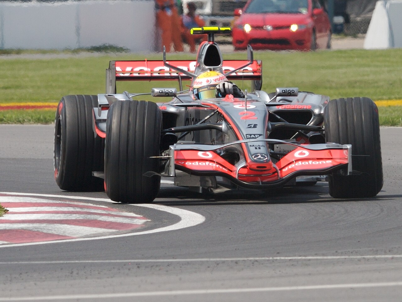 the championship-winning car corners at speed
