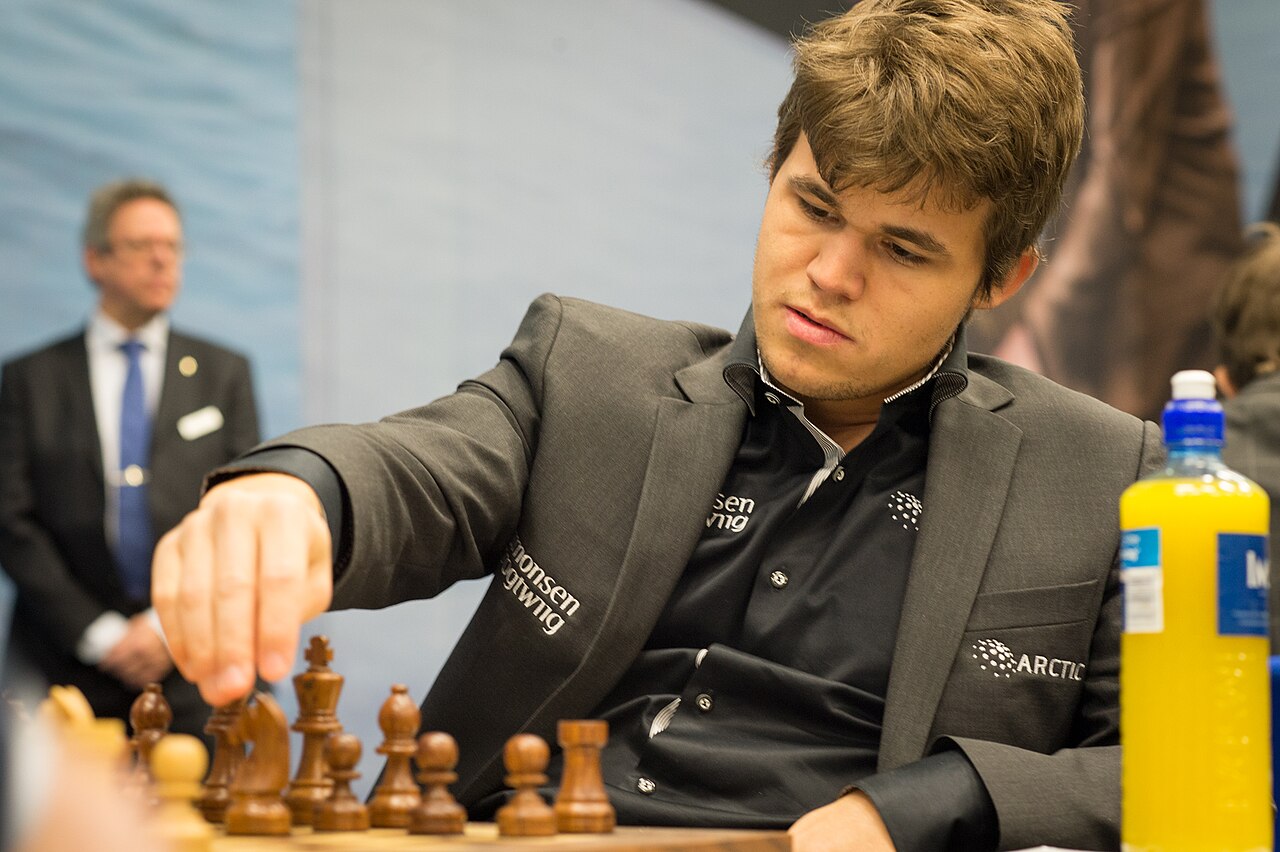 The new world champion moves a piece in Chennai