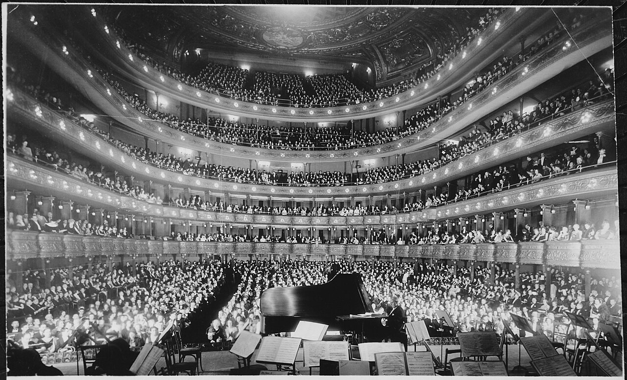The auditorium fills for the opening night performance of Faust